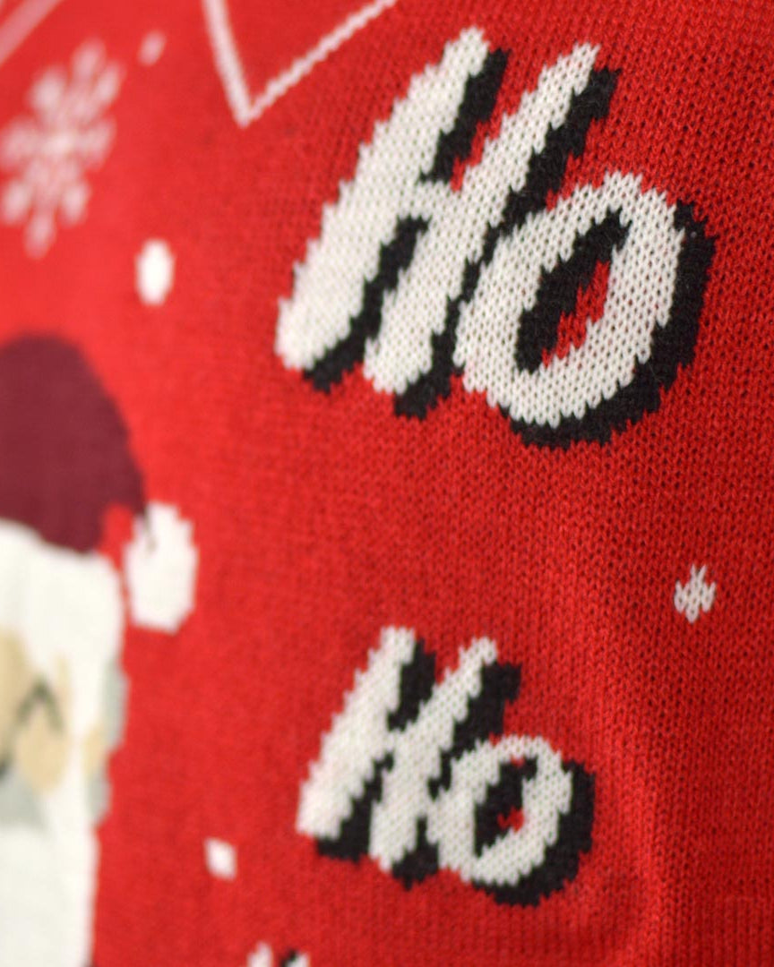 Couple's Ugly Christmas Sweater with Santa Coming through the Chimney detail
