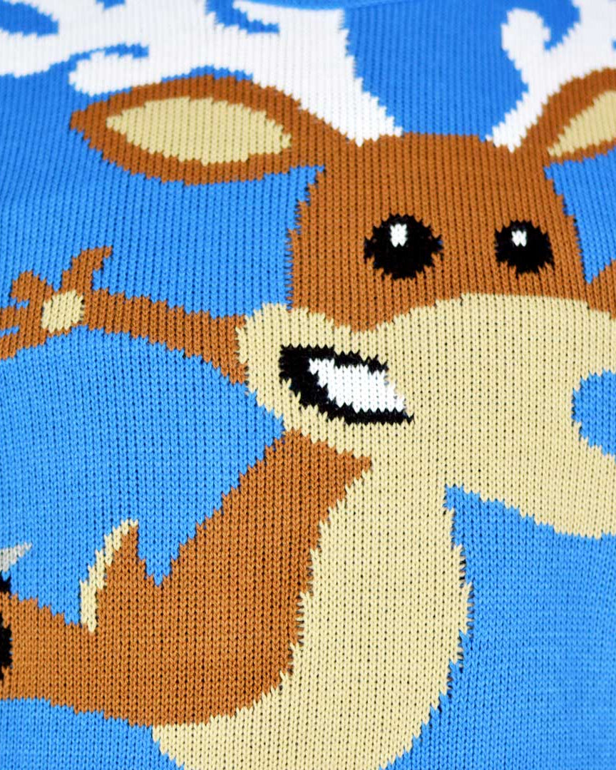 detail Light Blue Couple's Ugly Christmas Sweater with skating Reindeer