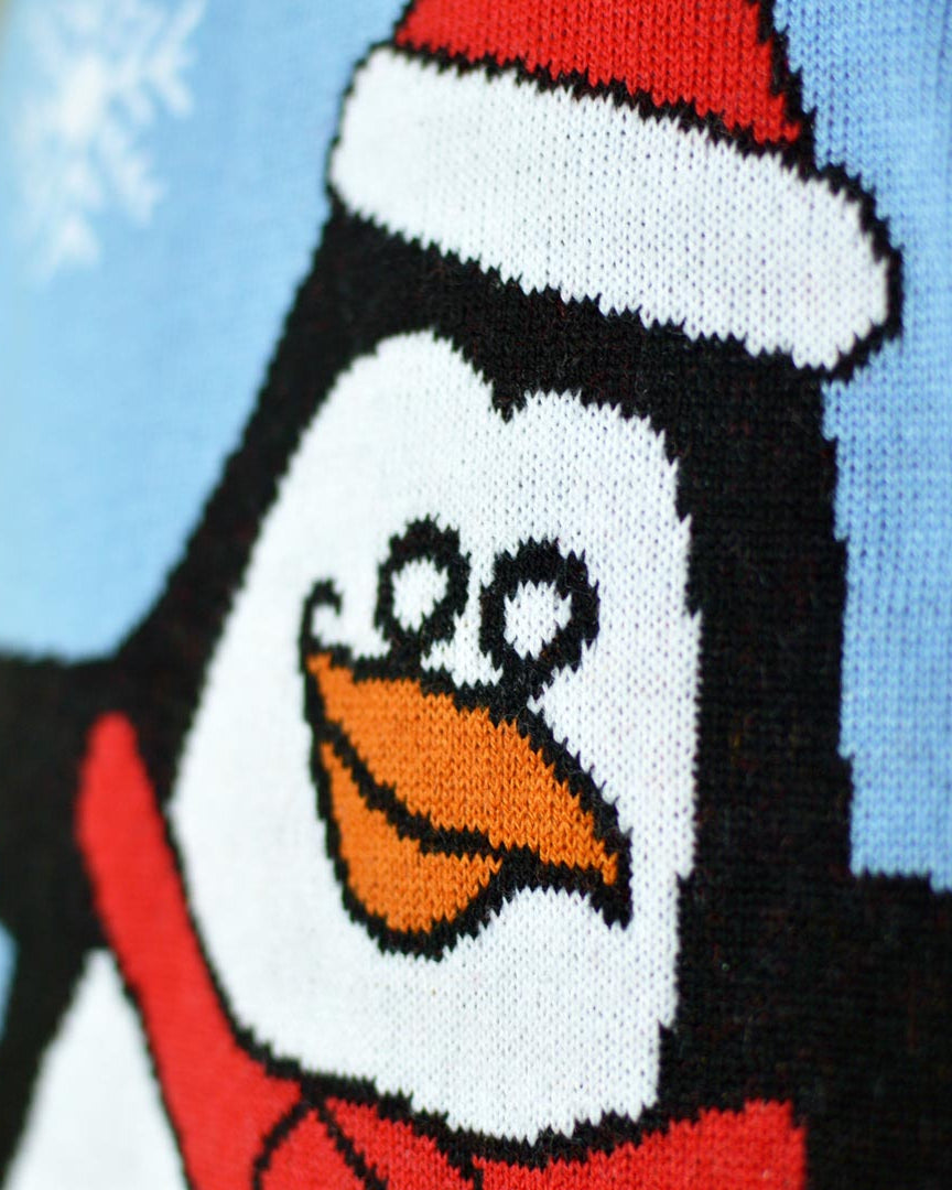 Light Blue Ugly Christmas Sweater with Penguin detail