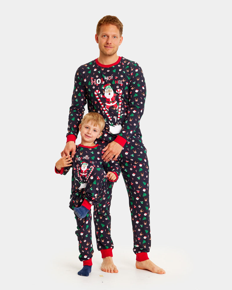 Ugly Christmas Pyjama Family with Skiing Santa