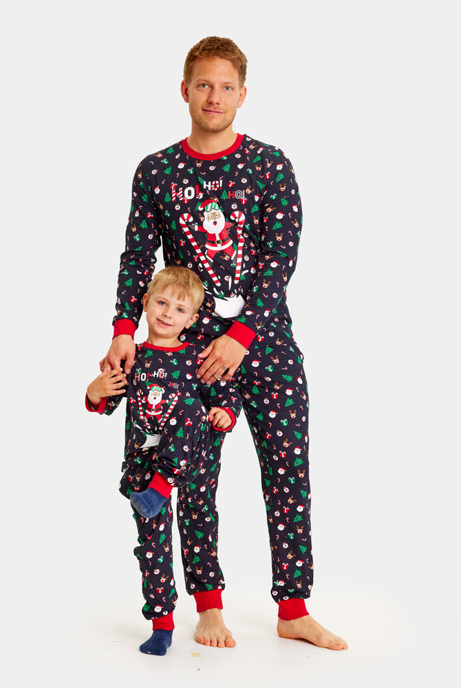 Ugly Christmas Pyjama Family with Skiing Santa